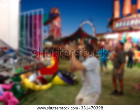 blurred background of carnival games