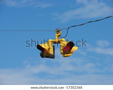 traffic safety lights hanging from wire
