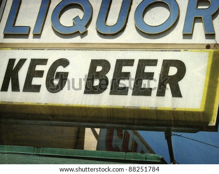 aged and worn vintage photo of  liquor store and beer sign