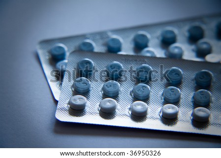 two plates of prescription pills