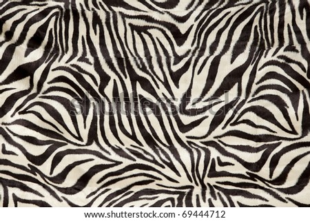 a zebra skin  patterned  fur background