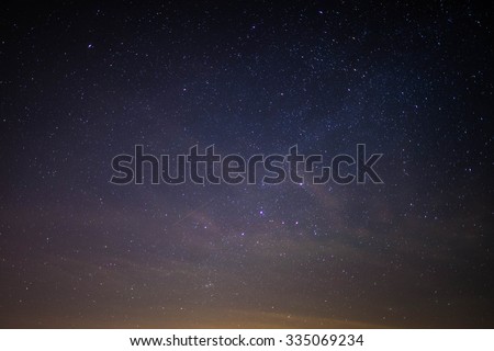Clear night sky with a shooting star
