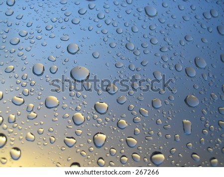 rain drops on the window, sunset in background, stormy clouds behind #4