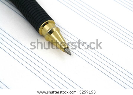 close-up of stave and ballpoint pen tip