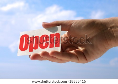 female hand holding card with open sign, photo does not infringe any copyright