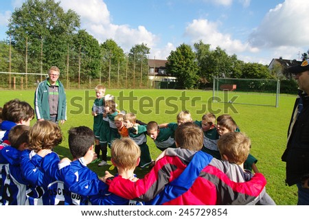 DUISBURG, GERMANY 22.09.2012 - Young football players meet on a football field for training and team games