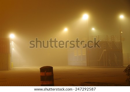 DUISBURG, GERMANY - 12 December 2013 View of work in Gate over fog in Logistics Center - Logport Duisburg