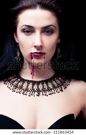 Vampire on black background