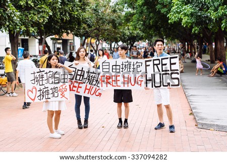 Taichung, Taiwan - July 25 2015: Offering free hugs on city street