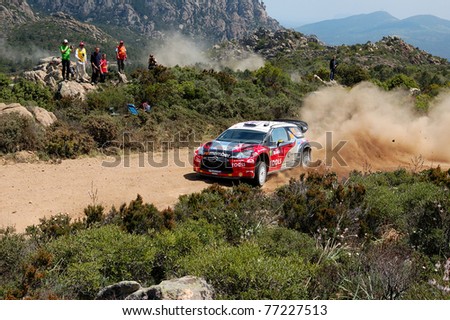 SARDINIA, ITALY - MAY 8: Petter Solberg drives a Mini World Rally Team car during Power Stage N. 18 