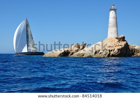 PORTO CERVO, ITALY - SEPTEMBER 10: The DSK Sailing team participates in the Maxi Yacht Rolex Cup boat race on September 10, 2011 in Porto Cervo, Italy.