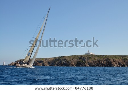 PORTO CERVO, ITALY - SEPTEMBER 10: The DSK Sailing team  in the Maxi Yacht Rolex Cup boat race on September 10, 2011 in Porto Cervo, Italy.