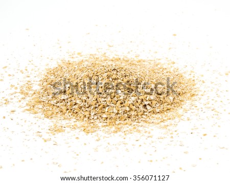 Pile of oat bran isolated on white.