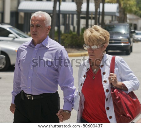 ORLANDO, FL - JULY 4:The parents of accused murderer Casey Anthony exits from the Orange County courthouse. Casey is accused of murdering her daughter Caylee Marie Anthony in Orlando, FL July 4, 2011.