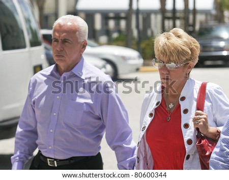 ORLANDO, FL - JULY 4:The parents of accused murderer Casey Anthony exits from the Orange County courthouse. Casey Anthony is accused of murdering her daughter Caylee Anthony in Orlando, Fl July 4, 2011.