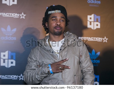 ORLANDO, FLORIDA - FEB. 24: Rap artist MANN attends the VIP All-Star party hosted by Dwight Howard and Adidas.  FEB. 24, 2012 in Orlando Florida.