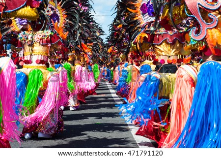 Street dancing parade of colorful mask and costume during the celebration of Masskara Festival at Bacolod City, Philippines