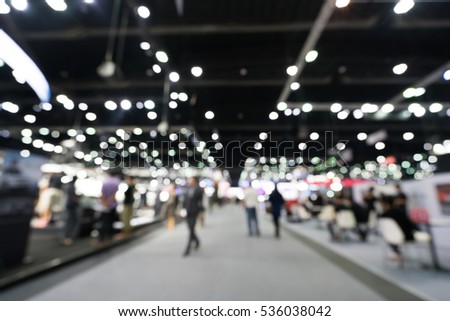 Blurred, defocused background of public event exhibition hall, business trade show concept