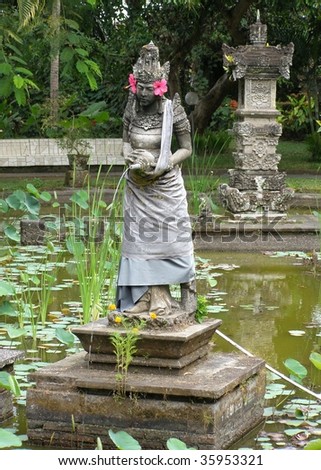 Sculpture and fountain garden in Bali - stock photo