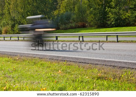 Fast moving motorcycle on highway