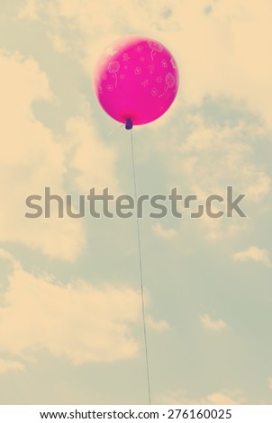 Vintage balloons flying in the sky