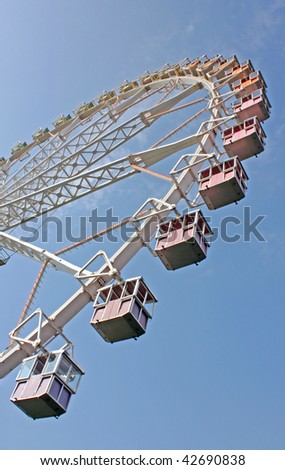 Ferris wheel with blue sky in background