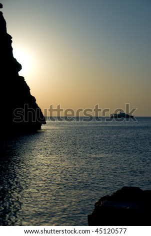 Silhouette of a Boat on the ocean at sunrise. Ras Mohammed National Park, Egypt.