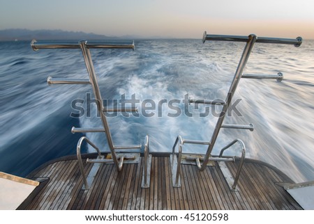 View of the ocean from the back deck of a dive boat.
