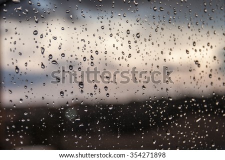 Glass with raindrops