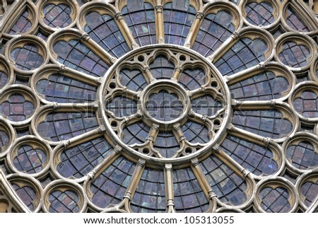 Large decorative oval church window with stained glass