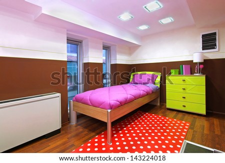 Small child bedroom interior with colorful furniture