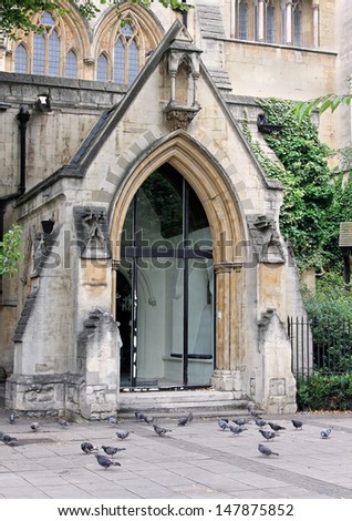 Entrance door of aged Victorian architecture cathedral