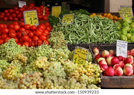 Fresh organic fruits and vegetables on market stall