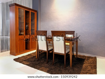 Dining room interior with retro furniture and sparkling wall