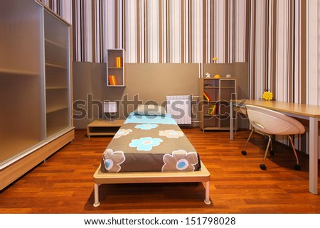 Modern child bedroom interior with beige furniture