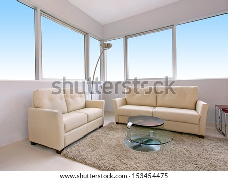 Modern living room interior with light furniture