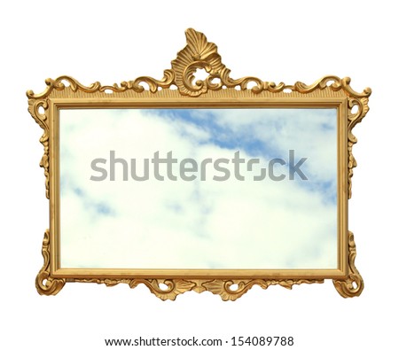 Old golden mirror frame with reflection of the sky