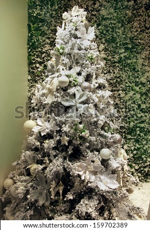 Christmas tree with white sparkling dust decoration