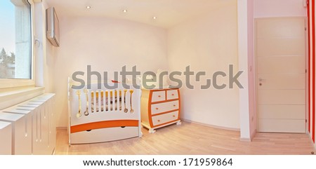 Nursery room interior newly decorated for newborn baby