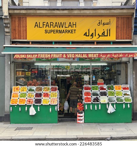 LONDON, UNITED KINGDOM - June 20; Small local ethnic food supermarket Alfarawlah in London, UK - June 20, 2012; Small food store where ethnic minorities buy their traditional halal meat and vegetables