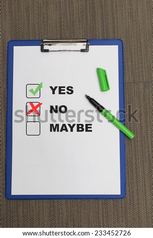 Check list on paper clipboard with green marker