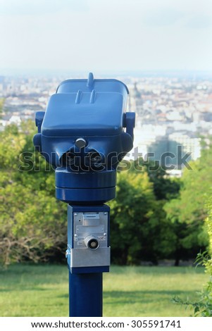 Coin operated binoculars viewer machine for tourists to look at architecture and landmarks