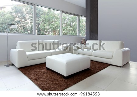 Modern living room interior with white furniture