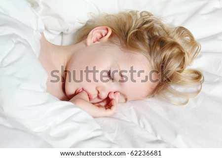 A Little Girl Sleeping, Thumb-Sucking And Having Sweet Dreams Stock ...