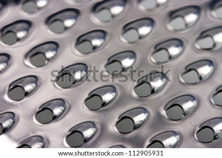 Closeup of a metal cheese grater