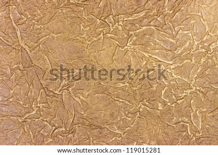 Abstract aged crinkled brown paper