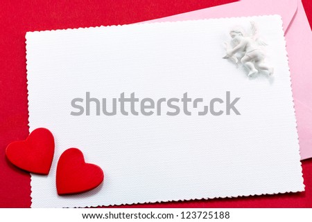 Valentine\'s greeting card with red hearts and angel