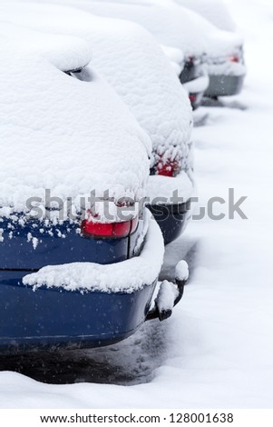 Snow covered cars after snowstorm