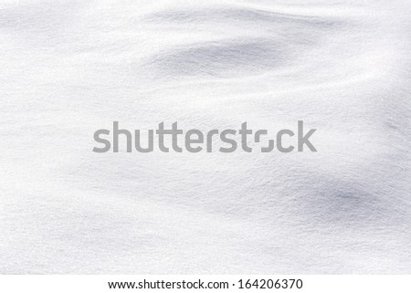 Texture of snow on sunny day