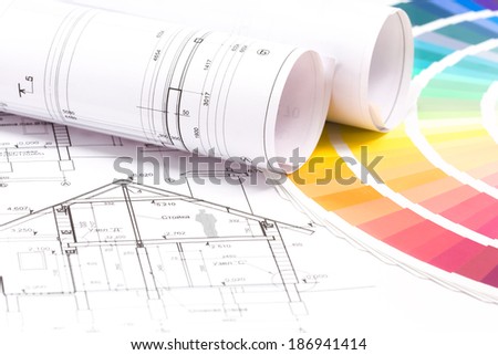 Architect\'s and designer\'s work space during work with technical drawing and color samples